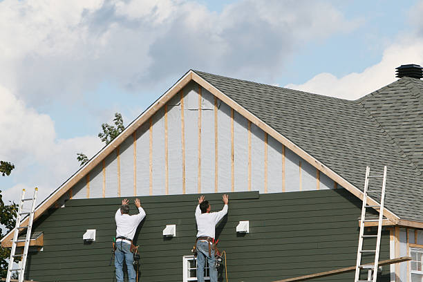 Professional Emergency Siding Repair technician working in Ridgeway, VA